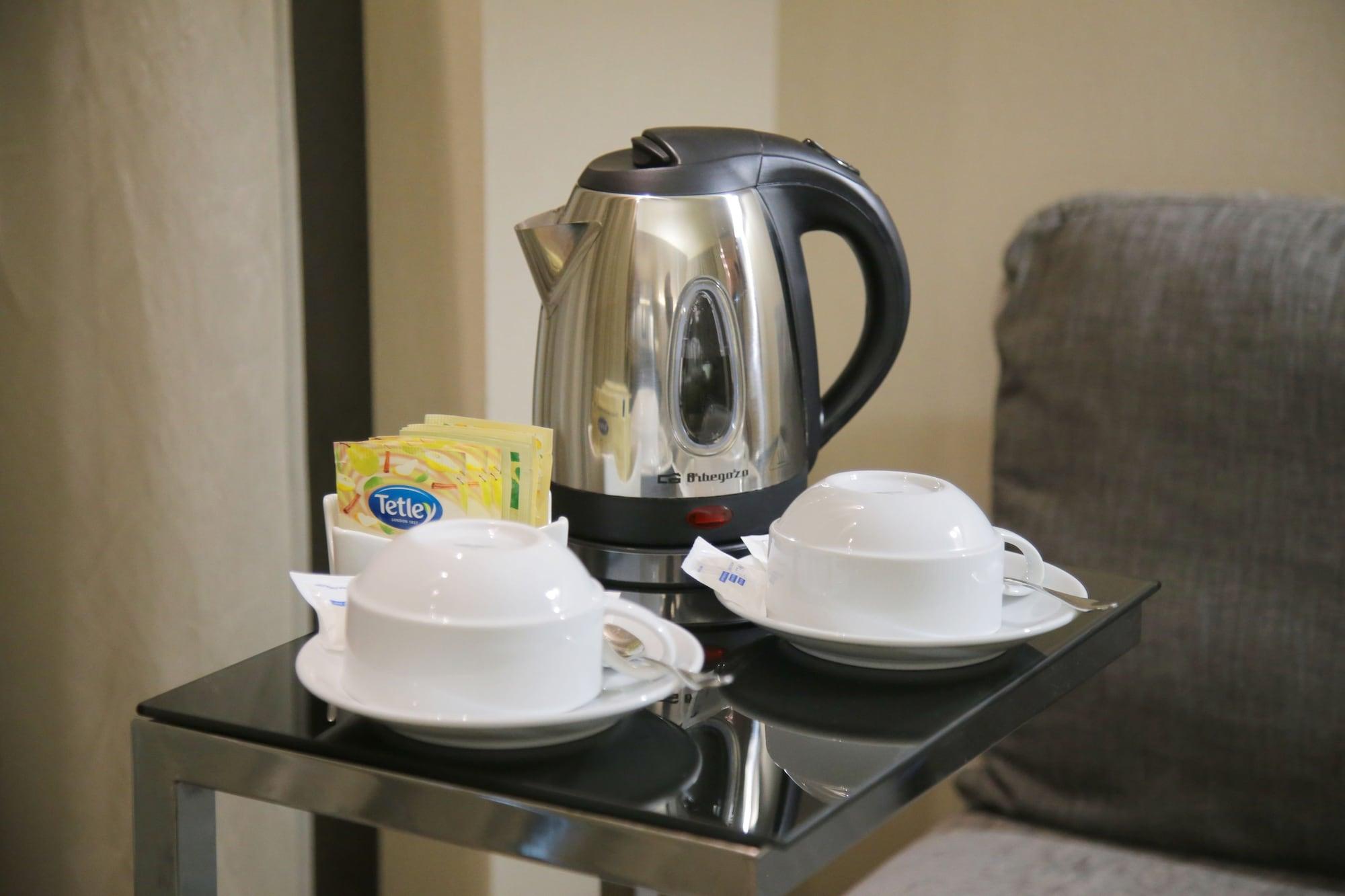 Melia Braga Hotel & Spa Eksteriør bilde A kettle with two cups