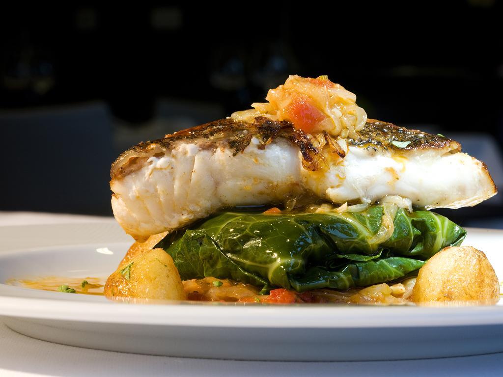 Melia Braga Hotel & Spa Eksteriør bilde A prepared dish of halibut